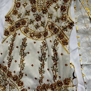 indian silvar kameez gold and white